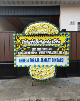 Papan Bunga Duka di Labuan Amas Selatan